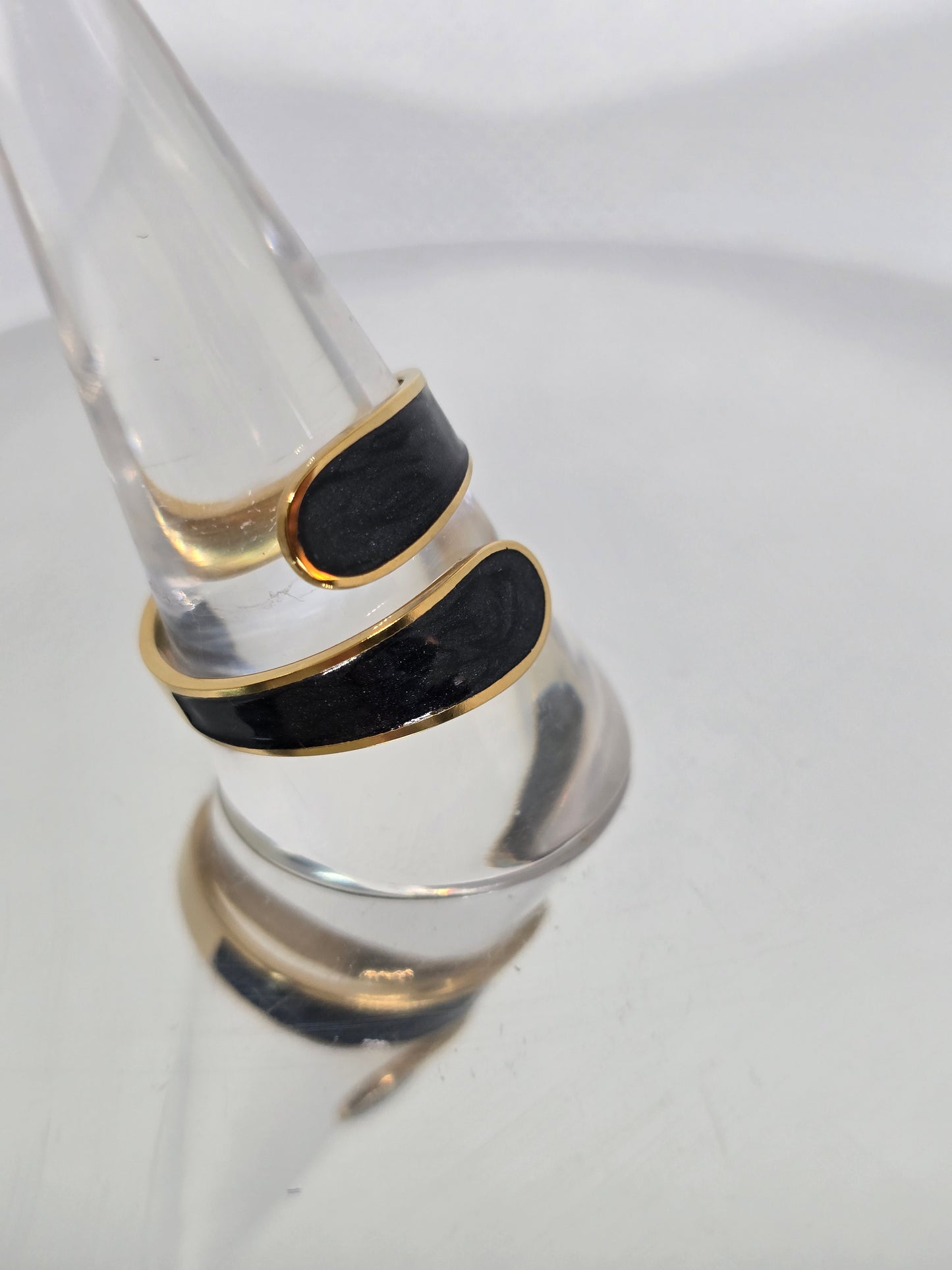 Finger hung in Black and Gold ring - By Bianci