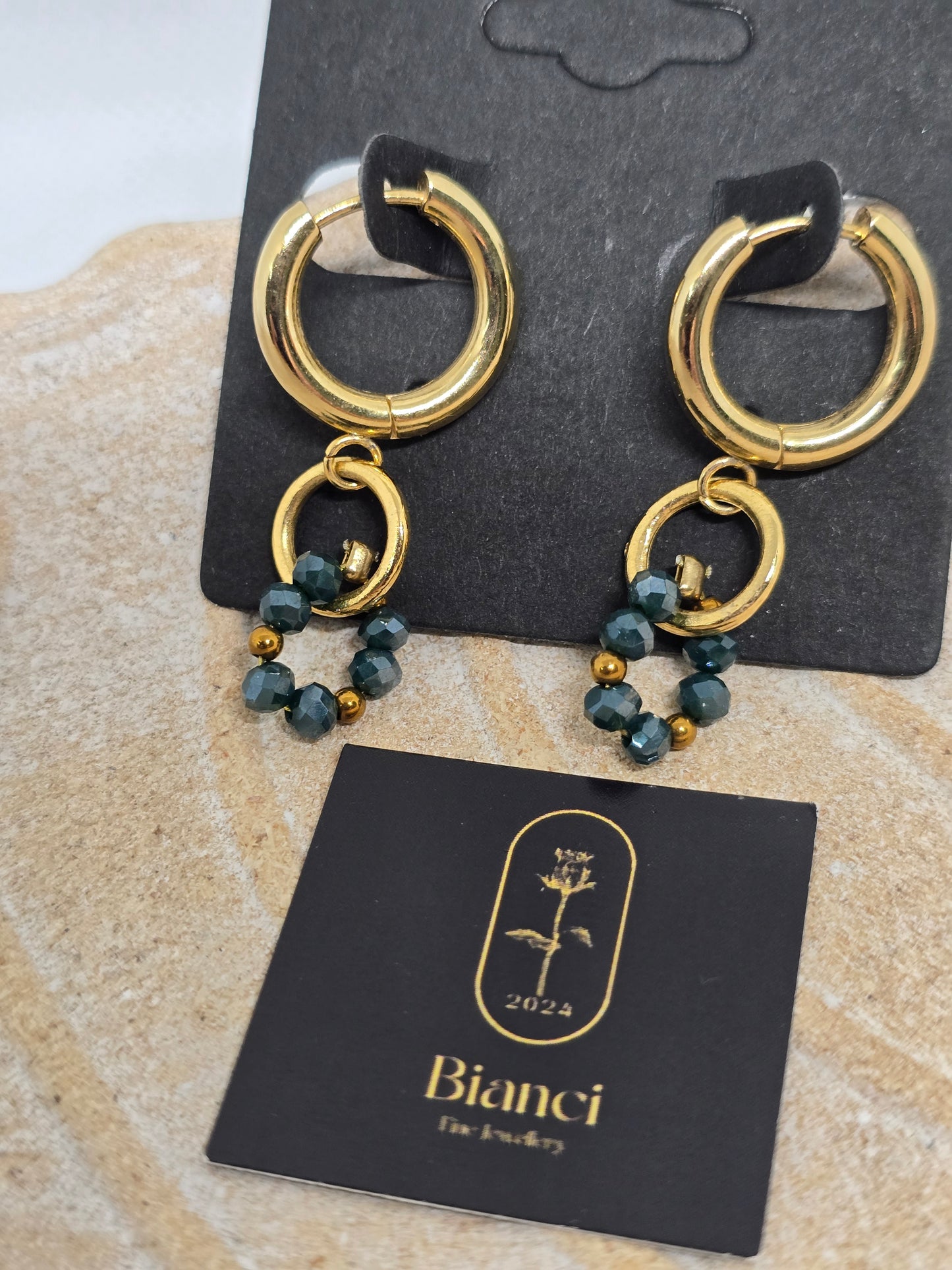 Gold circles with dark green beads earrings - By Bianci