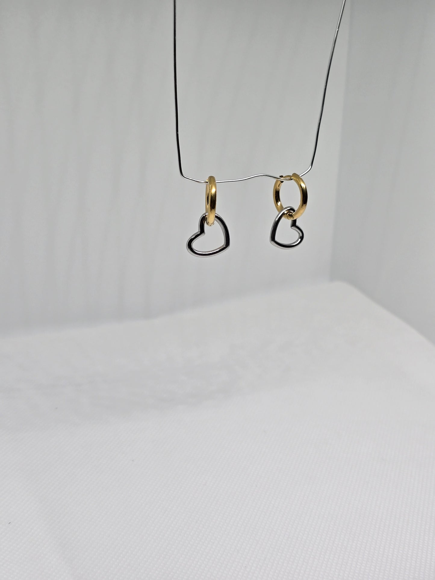 Silver hearts on Gold circles earrings - By Bianci