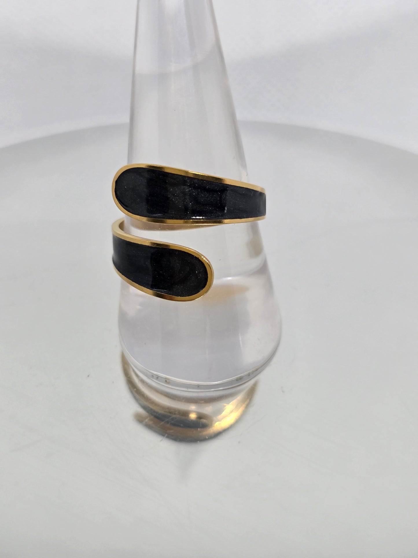 Finger hung in Black and Gold ring - By Bianci
