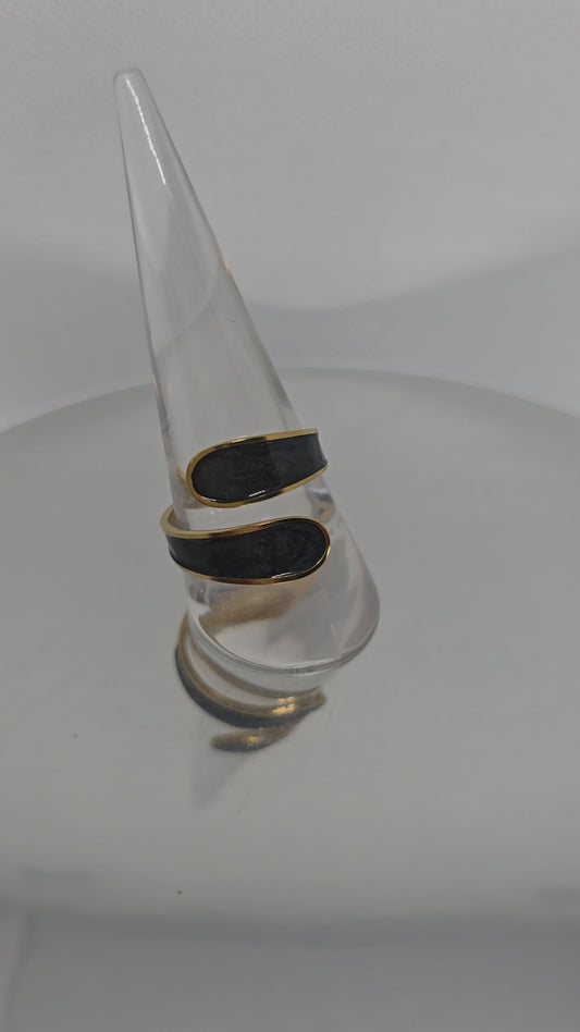 Finger hung in Black and Gold ring - By Bianci